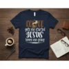 Navy t-shirt with white and brown text: "Coffee gets me started Jesus keeps me going" and coffee cup graphic