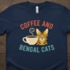 Coffee and Bengal Cats text with a cute Bengal cat and coffee cup graphic on a navy t-shirt