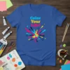 Color Your Life! text with a colorful abstract splash graphic on a blue t-shirt