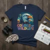 Colors Of Wildlife t-shirt design featuring a detailed eagle portrait with colorful mountains and text