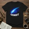 Black t-shirt with the word COMET in white, next to a blue illustrated comet streaking through space with stars