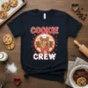 Cookie Crew t-shirt design featuring a bear chef holding a cookie with two smaller bears, surrounded by stars and text