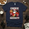 Cookie Security Christmas T-Shirt featuring Santa Claus in uniform holding a cookie and flashlight, with bold text