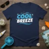 Navy t-shirt with "Cool Breeze" text in blue and white, featuring waves, palm trees, and seagulls graphic