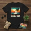 Cool Cat vintage retro design with a cat on a lounge chair under a palm tree at sunset, text reads