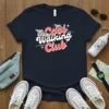 Cool Walking Club text with winged sneakers graphic on a navy t-shirt, representing fitness and active lifestyles