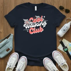 Cool Walking Club text with winged sneakers graphic on a navy t-shirt, representing fitness and active lifestyles