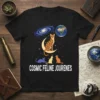 Black t-shirt with "COSMIC FELINE JOURENES" text and a design of cats in space, including a serval on the moon