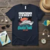 T-shirt with "Countdown Is Over It's Cruise Time ESTD. 2023" text, a cruise ship, palm trees, and sunset graphic