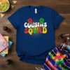 Cousins Squad text with red and green fist graphics on a navy blue t-shirt
