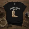 Black t-shirt with "Cowboy Legends Ride On" text and a brown ornate cowboy boot graphic