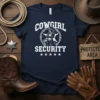 Cowgirl Security text with a graphic of a cowgirl inside a sheriff's badge and stars on a navy blue t-shirt