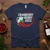 CRANBERRY BERRY JUICE text with a pitcher and cranberries graphic on a navy t-shirt