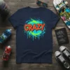 Navy t-shirt with the word CRAZY in orange graffiti font, surrounded by blue and green paint splatters and drips