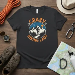 Crazy Hiking Lady t-shirt design featuring a silhouette of a hiker ascending a mountain path within a circular graphic