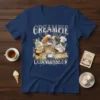Creampie Connoisseur t-shirt design with cats eating desserts and the text "CREAMPIE CONNOISSEUR" in silver metallic font