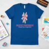 Creative Powerhouse Unleash Your Imagination text with pencils and bow graphic on blue t-shirt