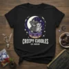 Creepy Cuddles Est. Forever t-shirt design with two gothic teddy bears sitting on a donut under a crescent moon