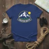 Crested Butte mountain logo t-shirt with trees and sun, for hikers and outdoor adventurers