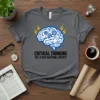 Critical Thinking The Other National Deficit text with brain and gears graphic on a grey t-shirt