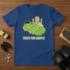 Crocs For Giants? text design on a blue t-shirt featuring a cartoon character holding a giant green croc shoe
