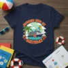 Cruising Into My Birthday t-shirt design with a cartoon cruise ship, palm tree, balloons, and hibiscus flowers. Features text "Cruising