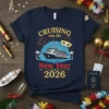 CRUISING into the New Year 2026 t-shirt design featuring a cruise ship, fireworks, and festive text