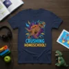Crushing Homeschool! T-Shirt with a T-Rex wearing sunglasses and a backpack, bold text