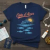 Navy blue t-shirt with "Côte d'Azur" text, a cruise ship, sun, and fish graphic