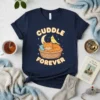 Cuddle Forever T-Shirt design featuring a sleeping orange cat and a yellow bird in a basket under a crescent moon