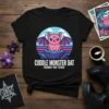 Cuddle Monster Bat Friendly But Fierce text on a black t-shirt featuring a pink bat character sitting on rocks