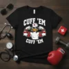 Black t-shirt with "CUFF 'EM CUFF 'EM" text and a muscular duck wearing sunglasses and a nurse's hat