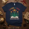 Cultura Es Poder Hispanic Heritage Month t-shirt with open book graphic and floral design, navy blue tee