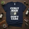Curly Hair Don't Care t-shirt featuring bold white text and a stylized profile of a woman with voluminous curly hair