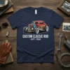 CUSTOM CLASSIC ROD EST. 1932 T-Shirt featuring a red hot rod with detailed engine and landscape background