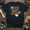 Cut Do It Again text graphic on a black t-shirt, featuring film clapperboard elements and director's hands