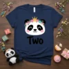 Cute panda face wearing a floral crown and gold tiara with the word "Two" below it, on a navy blue