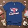 Cuterus t-shirt design featuring a pink uterus graphic with smiling eyes and a heart, text "Cuterus" below