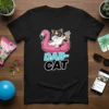 Dab Cat T-Shirt featuring a cat wearing sunglasses on a flamingo float, text "DAB-CAT" below