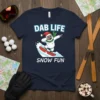 Navy t-shirt with "Dab Life Snow Fun" text and a yeti snowboarding, wearing a Santa hat