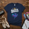 Navy blue t-shirt with "Dance Queen" text and a crowned ballerina graphic in pink and blue ribbons