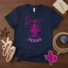 Navy t-shirt with "Dance Texas" text and a pink ballet dancer graphic with ribbon, suitable for dancers and Texas pride