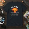 Danger Now A Teenager It's Official Attitude Alert text with explosion graphic on a dark t-shirt