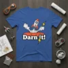 T-shirt with "Darn it!" text and cartoon rocket launching from an erupting volcano with lightning bolts