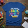 Teacher appreciation t-shirt with "dear parents TAG! YOU'RE IT! love, Teachers" text and school-themed graphics like a pencil and ABCs