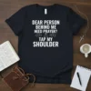 Christian t-shirt with white text "Dear Person Behind Me Need Prayer? Tap My Shoulder" and praying hands graphic