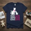 Navy t-shirt with "DEDICATE ADVOCATE EDUCATE" text in white and pink, featuring silhouette cats and a pink heart