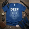 DEEP text above a vintage diving helmet with water ripples and bubbles on a blue t-shirt