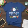DEFINITELY THE TYPE TO Ask "What day is it? daily" text on a blue t-shirt with clock and children graphics