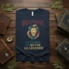 Delphine La Femme Le Mythe La Légende text with a majestic lion graphic on a navy t-shirt